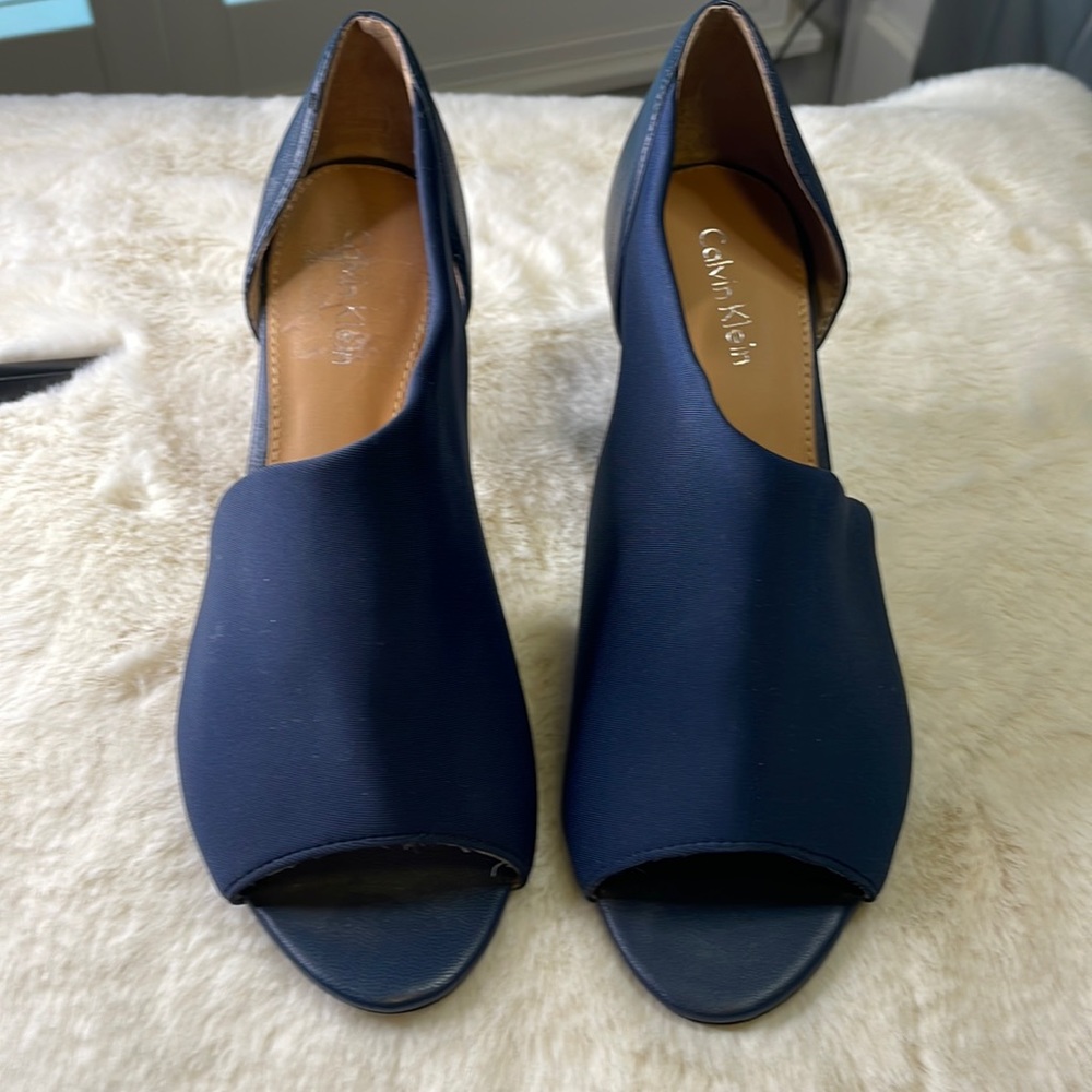 Calvin Klein size 6M dress pump. Navy blue with leather heels. 2” heels. Worn 1x